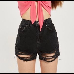High rise black denim ripped mom shorts.